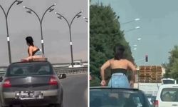 Otomobilin tavanına çıkan kişilere gözaltı