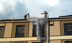 Eşiyle tartışıp çatıya çıkan genci Başkan son anda çekip aldı